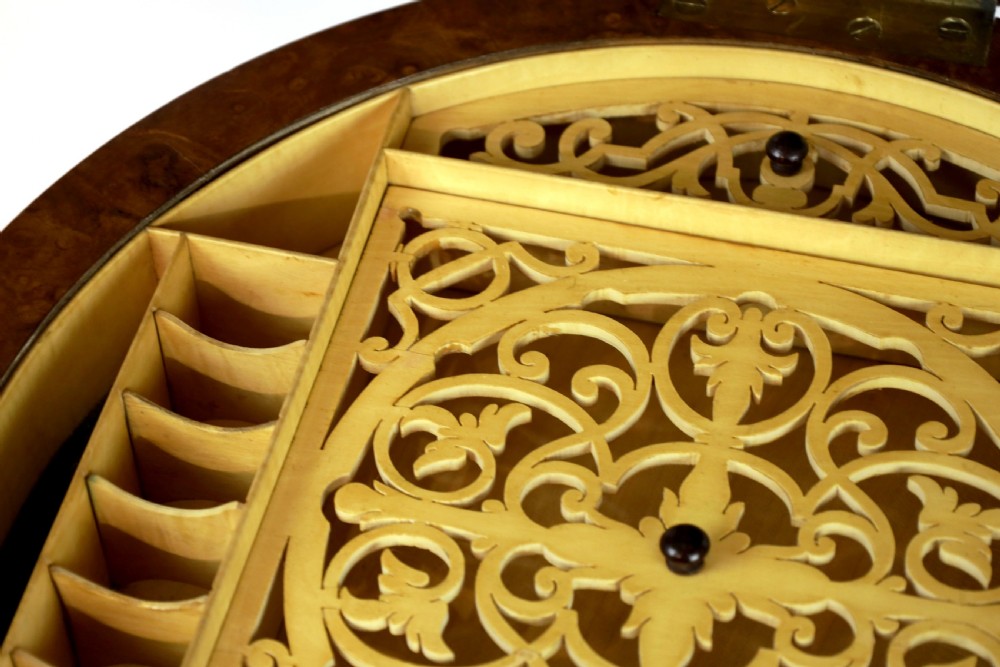 A Victorian Walnut Circular Work Table in the Manner of Gillows View IX