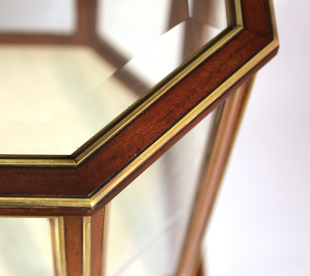 A Quality Victorian Mahogany Brass Bound Tiered Canted Display Cabinet View II