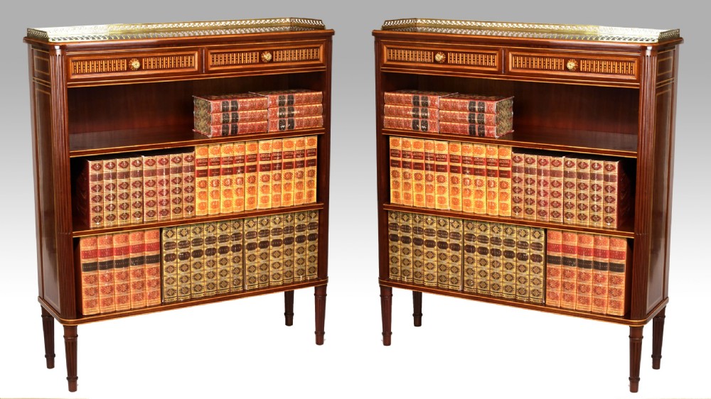 An Exhibition Quality Pair of Mahogany Inlaid Standing Bookcases