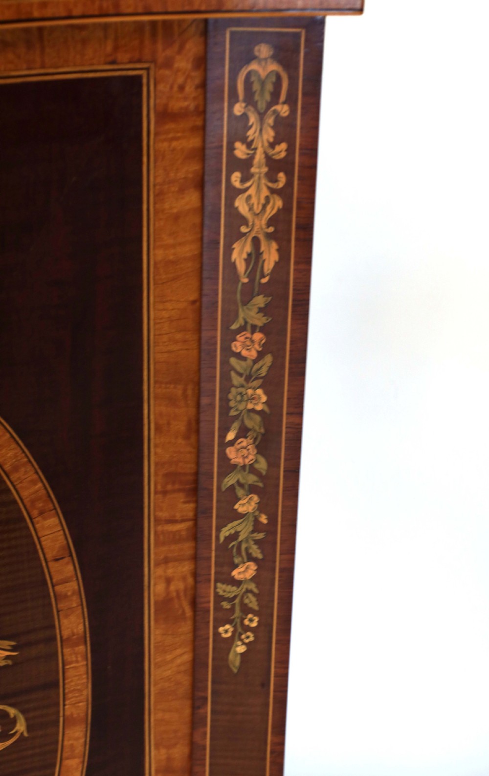 A Superb Late Victorian Mahogany Inlaid Serpentine Commode View V