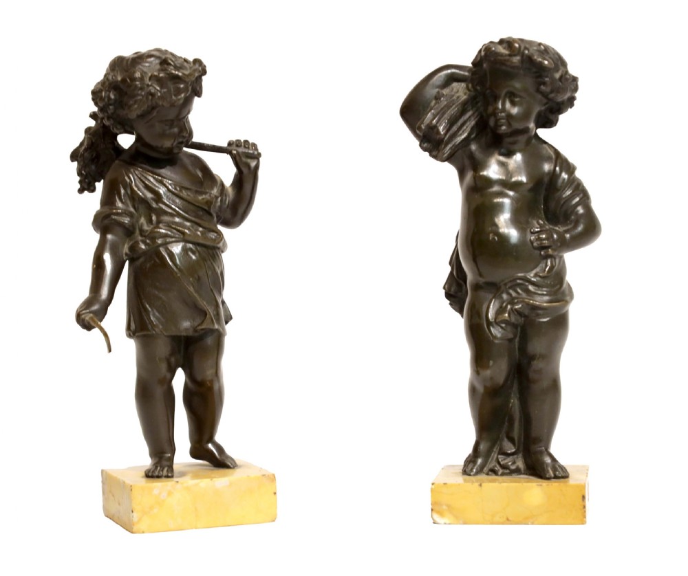 A Pair Of Victorian Bronze and Sienna Marble Harvest Putti Sculptures
