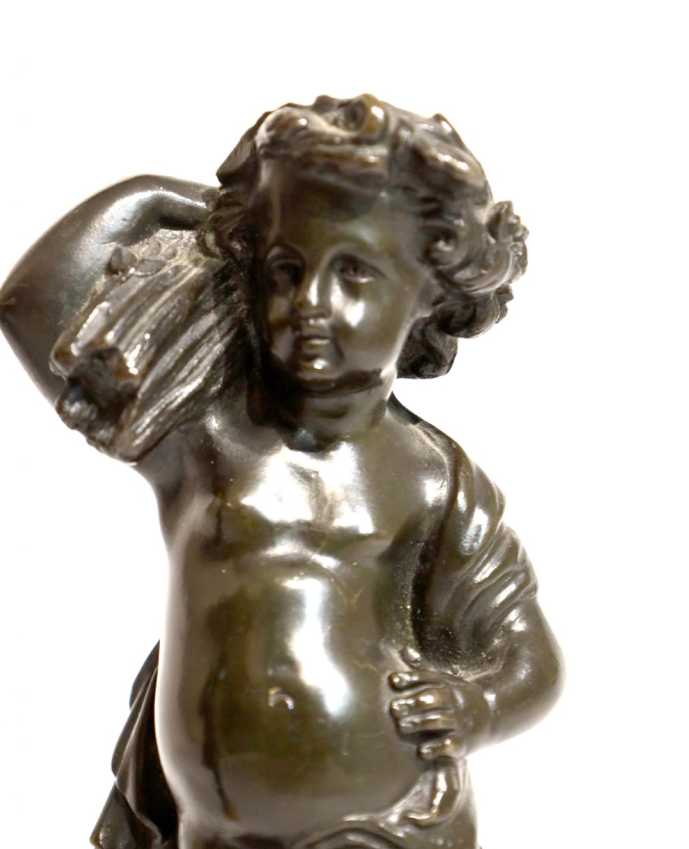 A Pair Of Victorian Bronze and Sienna Marble Harvest Putti Sculptures View II