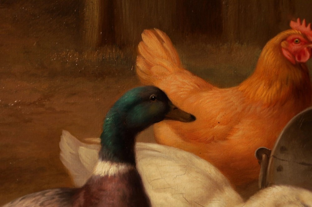 A framed oil painting depicting chickens, a cockerel, and ducks feeding outside a wooden barn, set within an ornate gilded frame. View VII