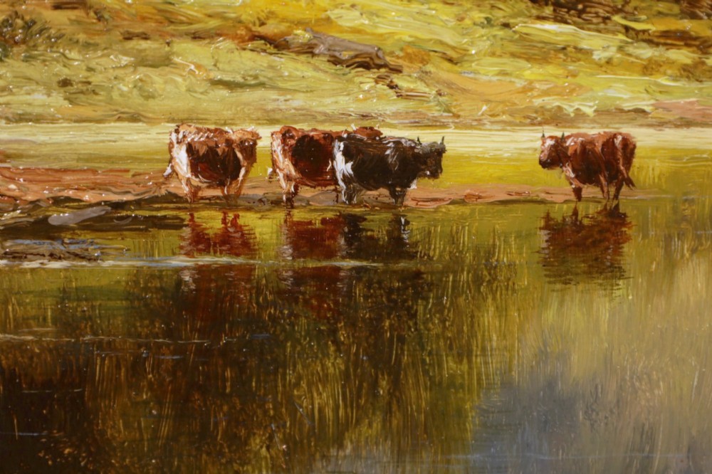 A Victorian oil painting depicting cattle watering at a mountain lake, housed within a deeply carved giltwood frame. View II