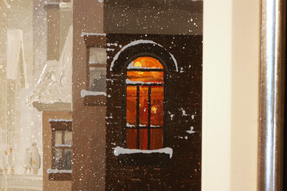 A framed oil painting on canvas depicting a snowy northern townscape with figures walking along a street lined with buildings leading towards a tall church spire. View III