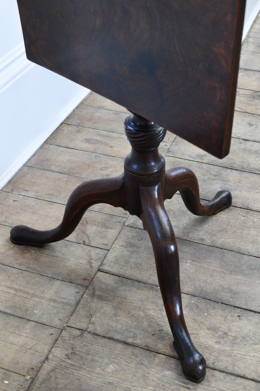 An 18th-century dark mahogany tripod table featuring a square top supported by a turned stem with a spiral baluster detail and three cabriole legs ending in pad feet. View II