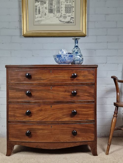 A Small Mahogany Bow Front Chest of Drawers - George III Period