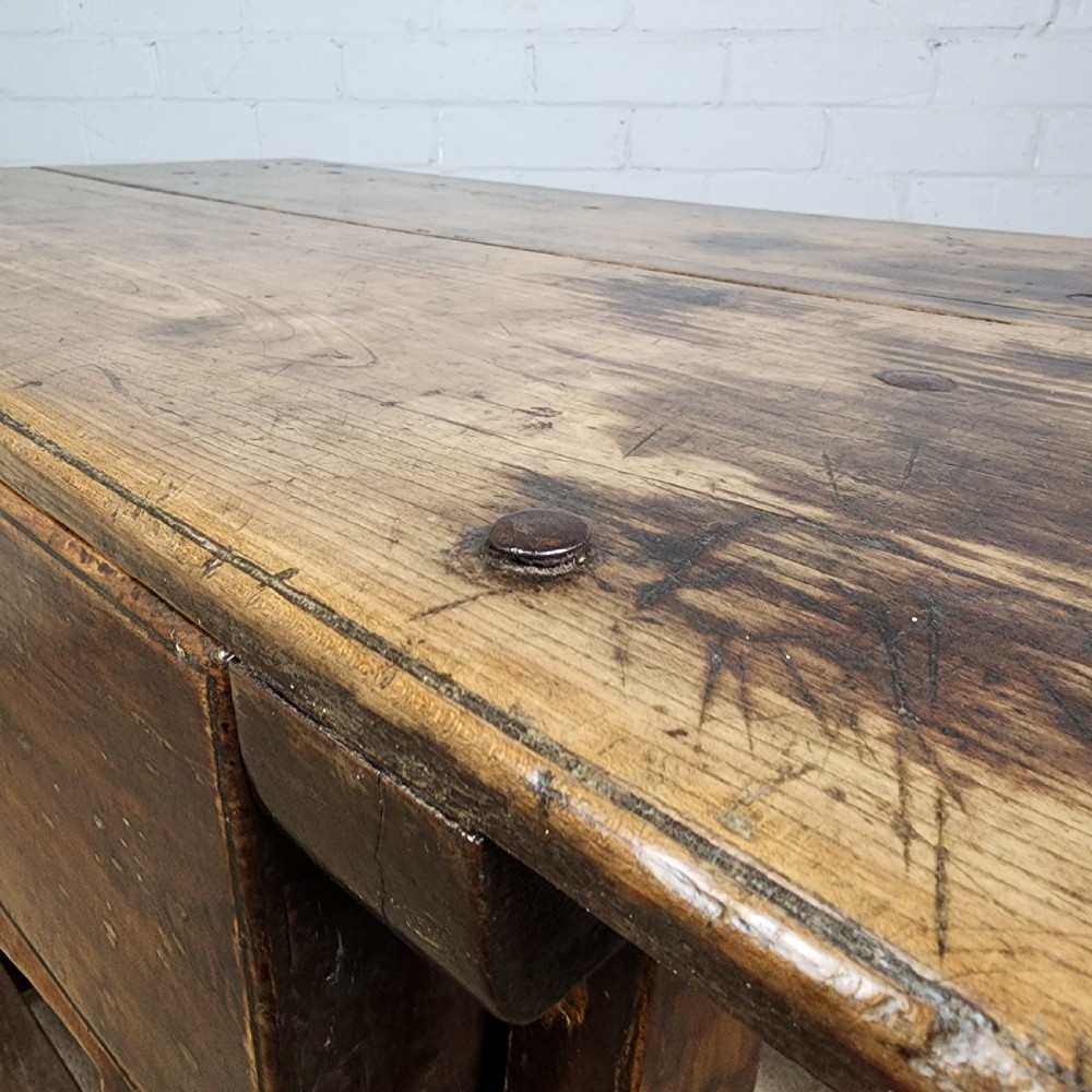 A 17th-century Spanish chestnut side table with a single drawer featuring a central wrought iron ring pull and a box stretcher base. View X