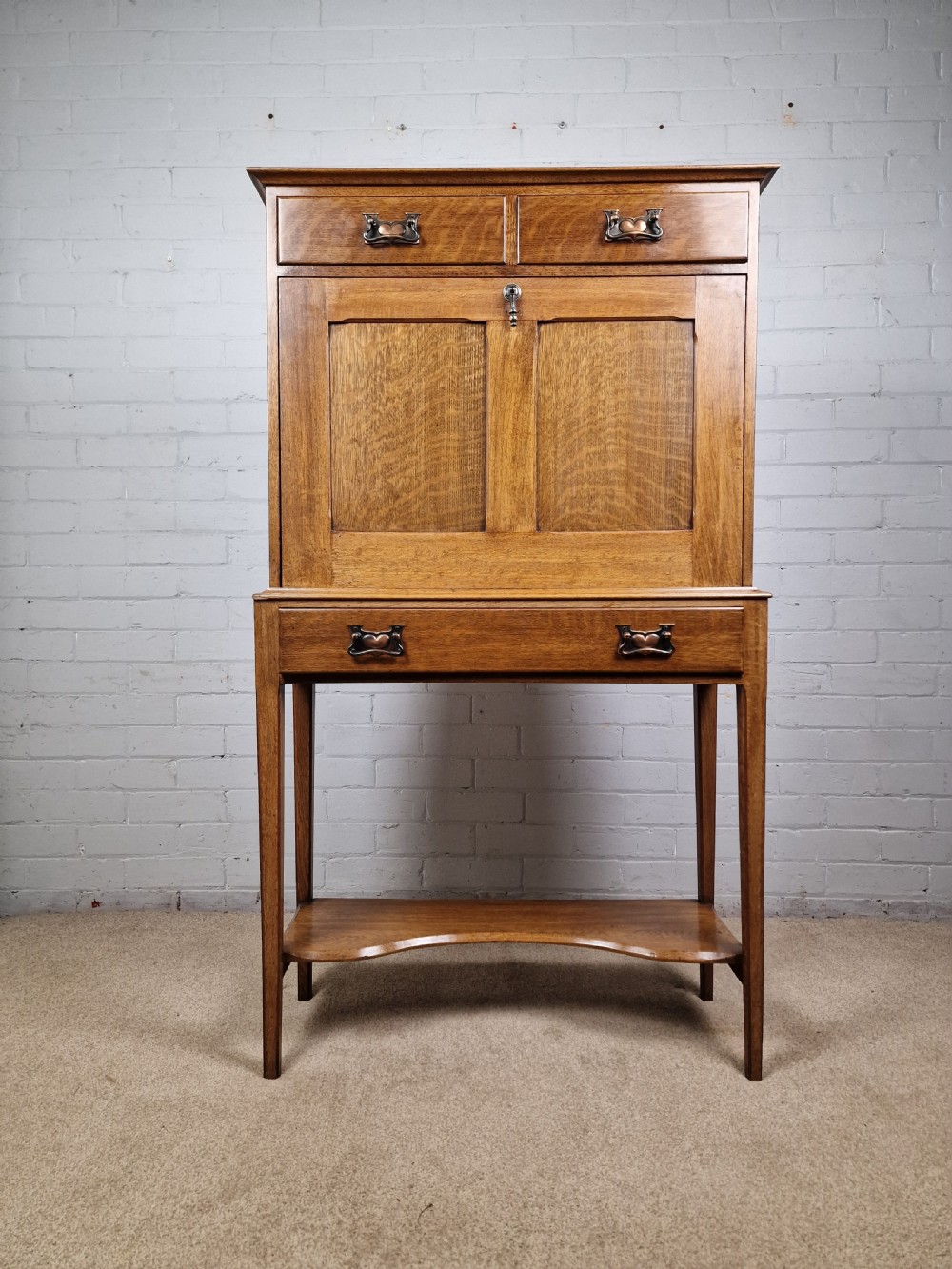 Arts and Crafts Oak Secretaire, with fall front. Early 20th C. View XII