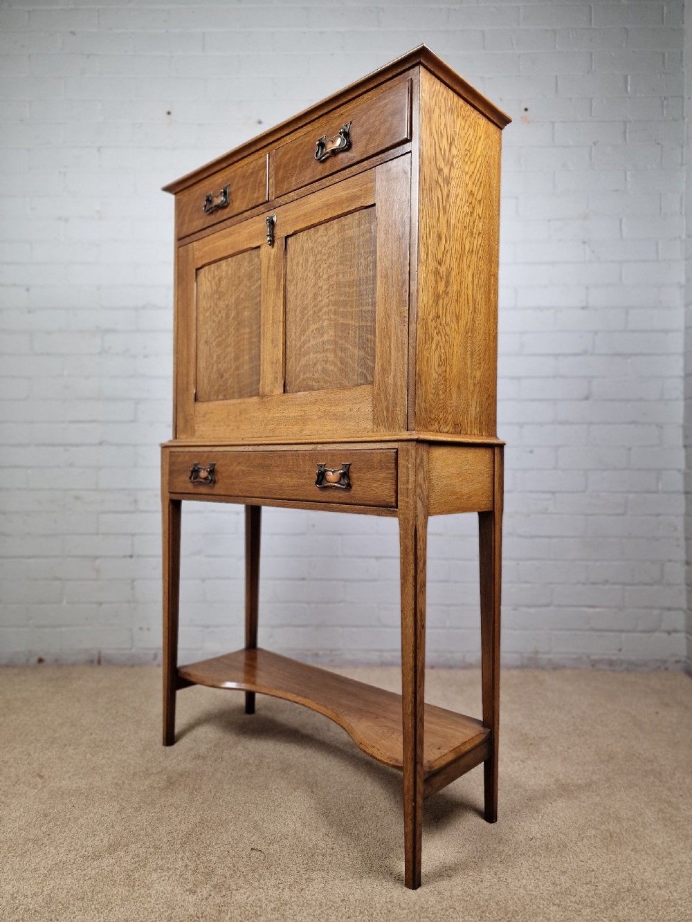 Arts and Crafts Oak Secretaire, with fall front. Early 20th C. View IX