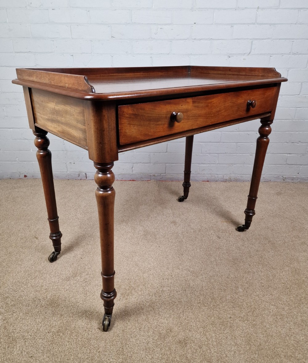 Howard and Sons Mahogany Writing Table - Mid Victorian View XI