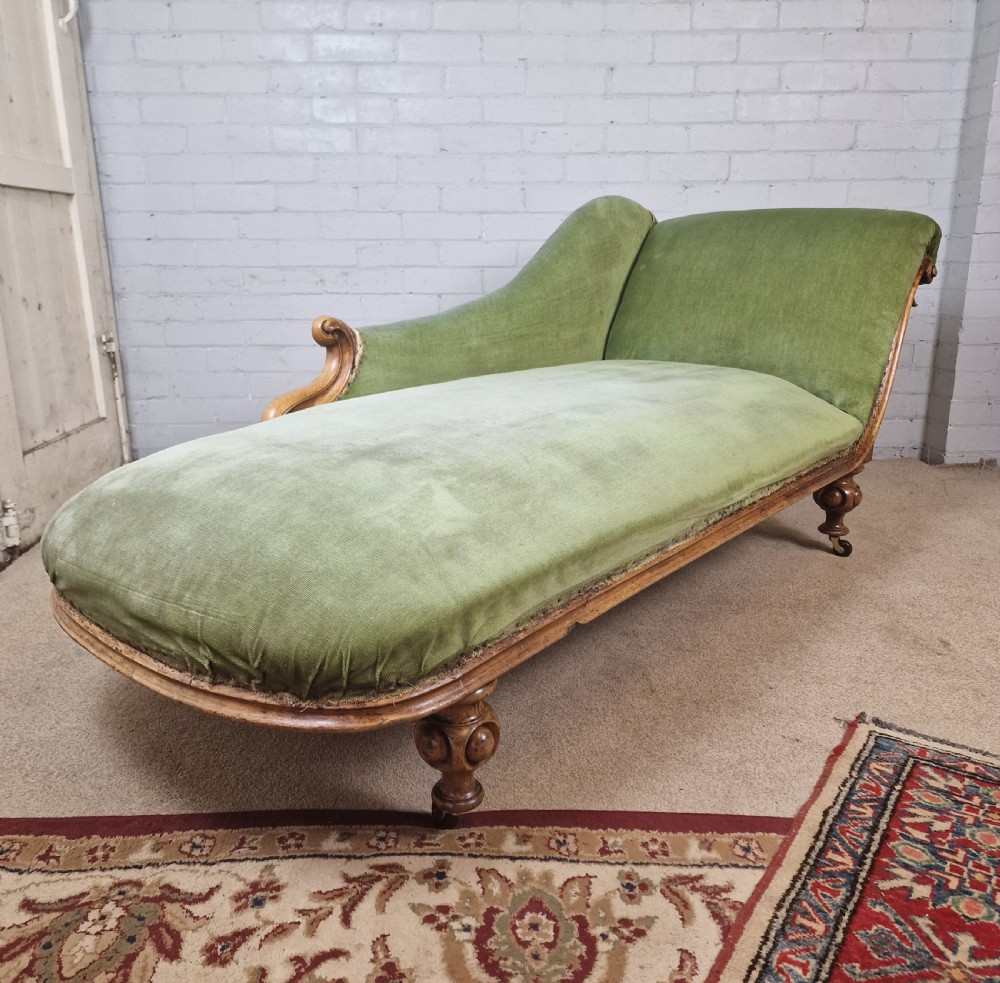 A Victorian Mahogany Chaise Longue with Ceramic Castors