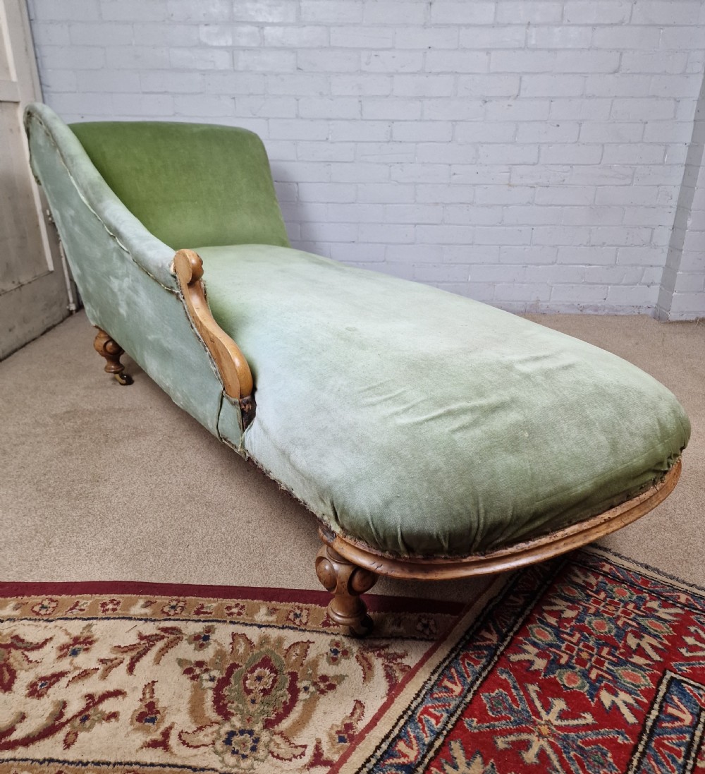 A Victorian Mahogany Chaise Longue with Ceramic Castors View IV