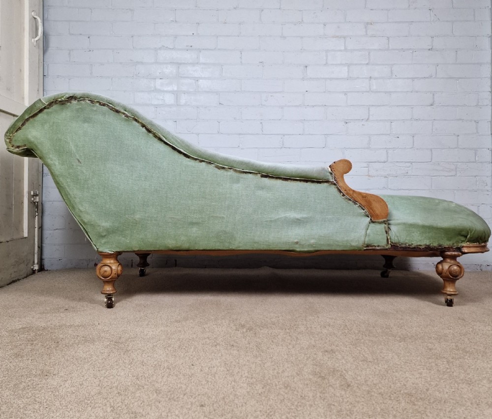 A Victorian Mahogany Chaise Longue with Ceramic Castors View VI