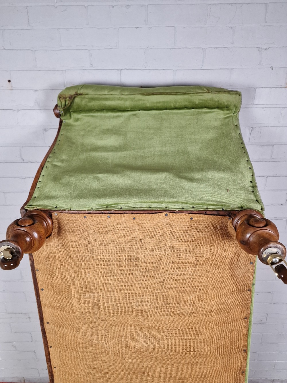 A Victorian Mahogany Chaise Longue with Ceramic Castors View XI