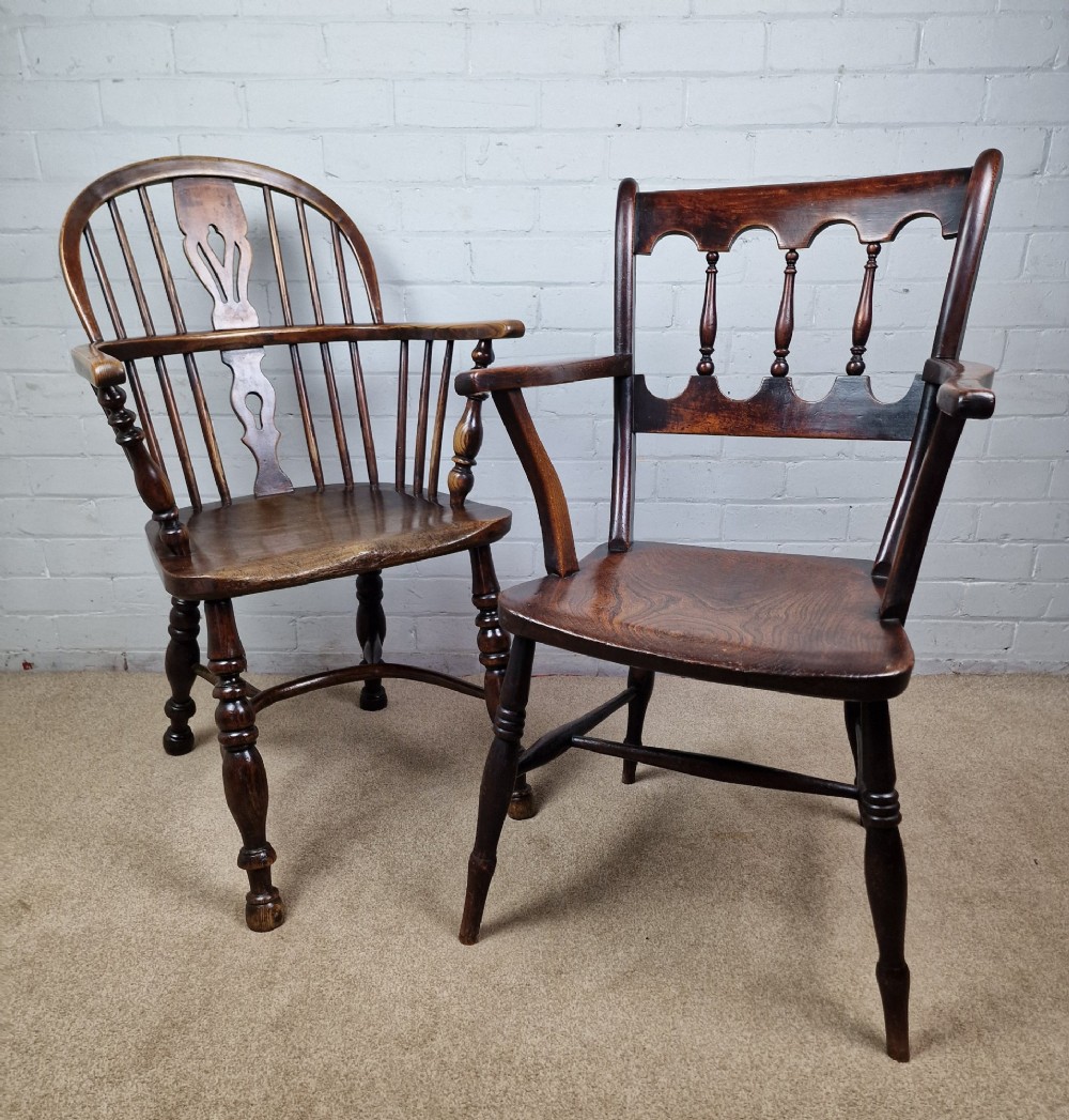 A Victorian dark brown elm and beech Oxford bar back Windsor armchair featuring turned spindles, shaped armrests, and turned legs with stretchers. View IX