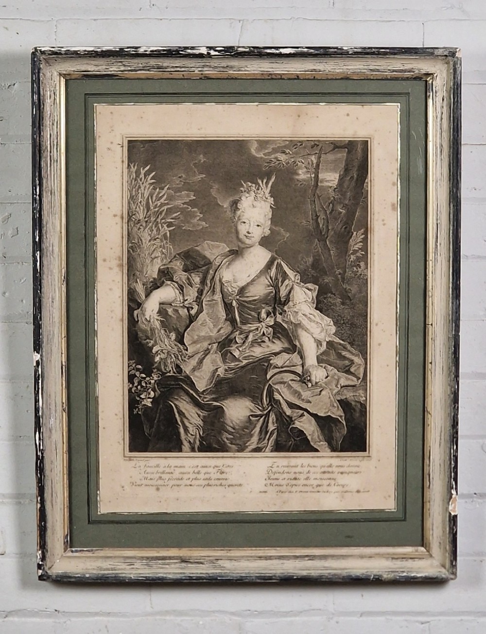 A pair of framed 18th-century French portrait engravings featuring seated female figures, presented in distressed wooden frames with green and cream double mounts. View III