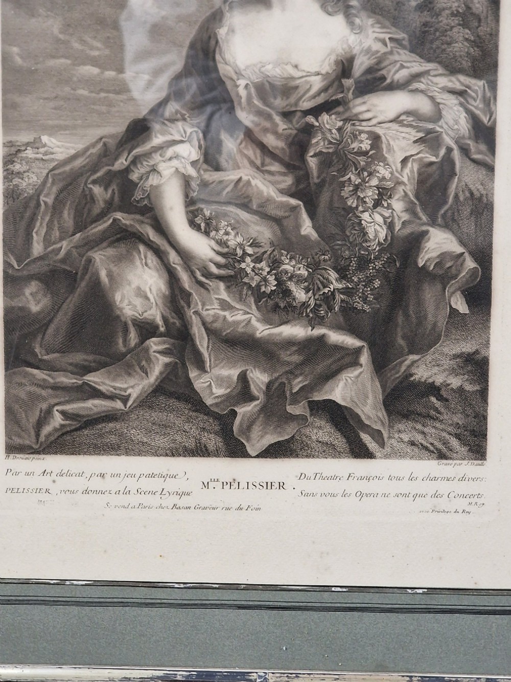 A pair of framed 18th-century French portrait engravings featuring seated female figures, presented in distressed wooden frames with green and cream double mounts. View IV