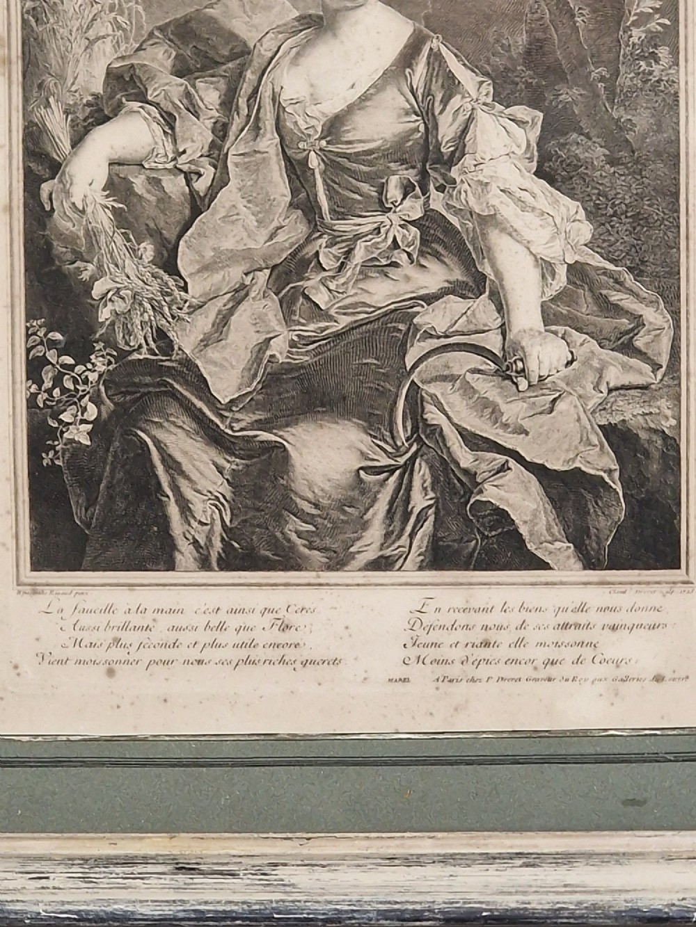 A pair of framed 18th-century French portrait engravings featuring seated female figures, presented in distressed wooden frames with green and cream double mounts. View V