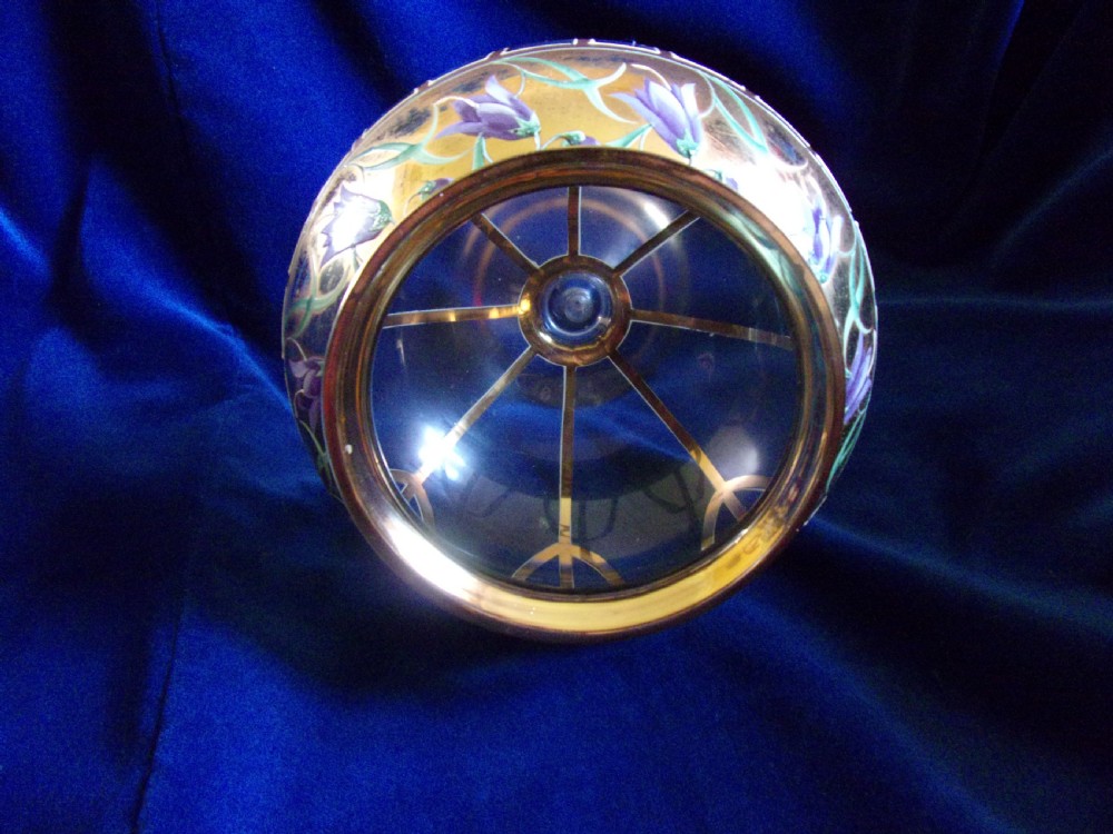 An Art Nouveau footed glass vase featuring a wide gilded collar, hand-painted purple enamel bellflowers, green foliage, and geometric lower panelling. View IV