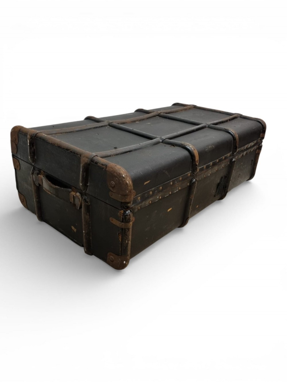 A rectangular black travel trunk featuring dark wooden reinforcement bands, brass latches, and reinforced metal corner caps. View VIII