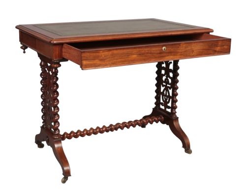 A Victorian rosewood writing table