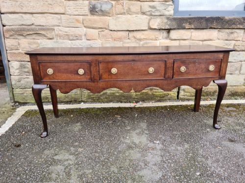 A 18thcentury Oak Low Dresser on Cabriole Legs