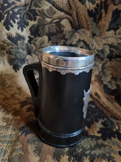 fig 1. ASPREYS SILVER MOUNTED DOULTON