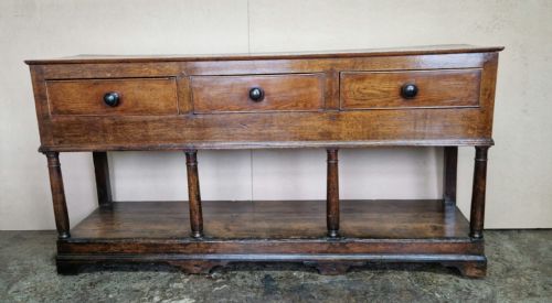 A Small E 19th C Oak South Wales Potboard Dresser Base.
