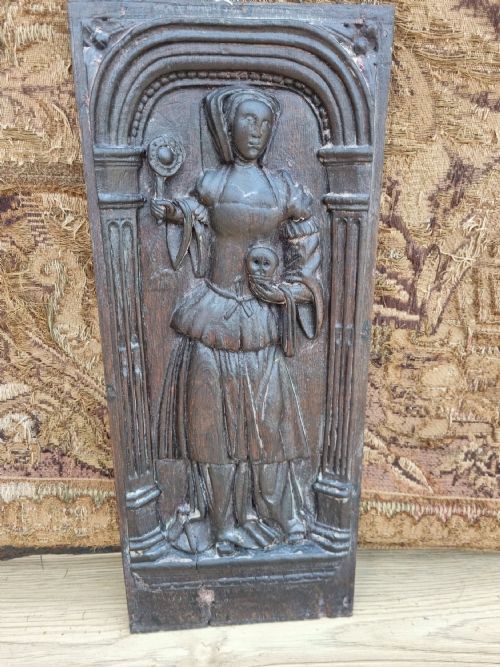 E 17thc Oak Carved Panel of a Lady Holding a Skull and Orb.