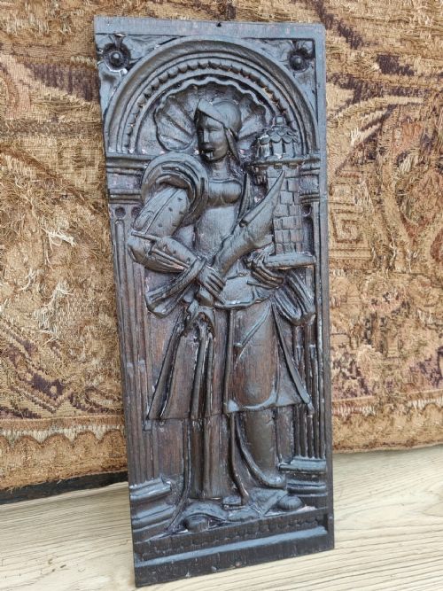A Late 16thc/e17thc Oak Panel of a Knight