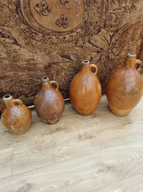 A Matched Set of 4 17th C Stoneware  Wine Jars (Bellamines)