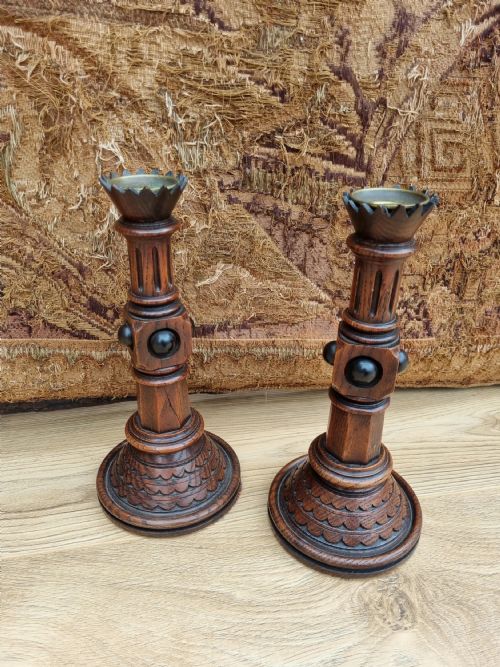 A Pair of Oak and Ebonized Gothic Candlesticks by a W Pugin