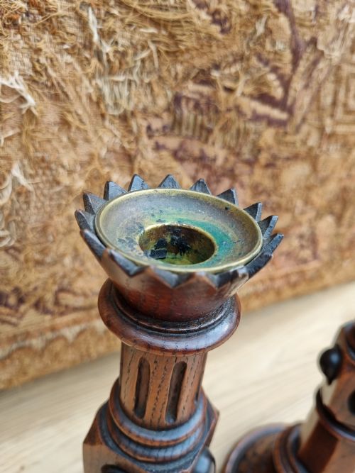 fig 1. A PAIR OF OAK AND EBONIZED GOTHIC CANDLESTICKS BY A W PUGIN
