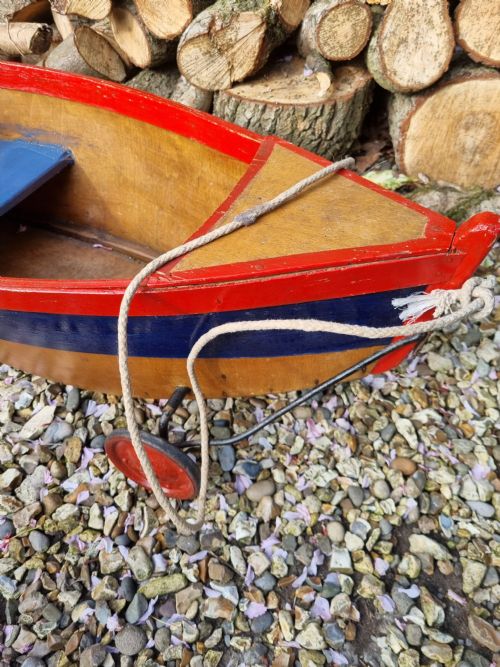 fig 1. UNUSUAL ANTIQUE CHILDS SIT IN PULL ALONG BOAT