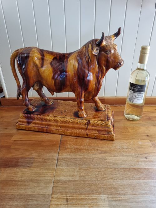 fig 1. A LARGE POTTERY MODEL OF A BULL USED IN BUTCHERS SHOPS AS ADVERTISING