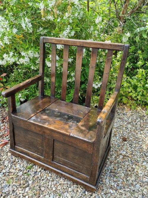 A Rare Small 18thc Welsh Oak and Pine Box Seat Settle.