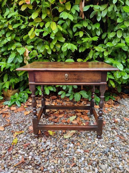 A Simple Honest Early 18thc Oak Side Table with Drawer .