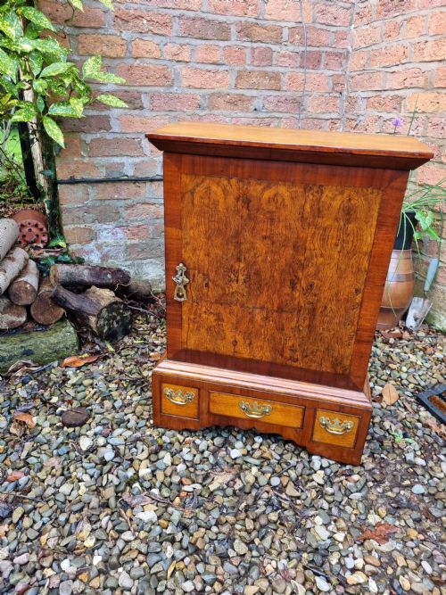 fig 1. GEORGIAN OAK AND MAHOGANY SPICE CUPBOARD.