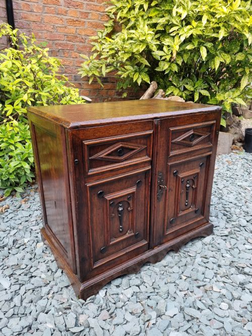fig 1. A LATE 17THC ENGLISH OAK WALNUT AND EBONY STANDING SPICE CUPBOARD C1710

