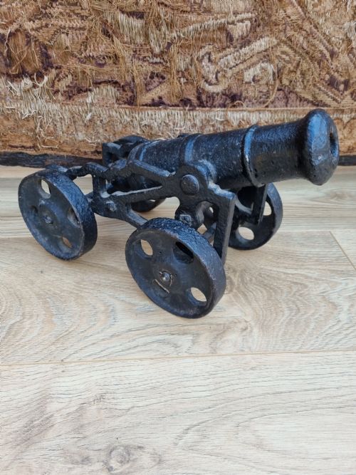 fig 1. AN  ANTIQUE CAST IRON TABLE/MODEL CANNON