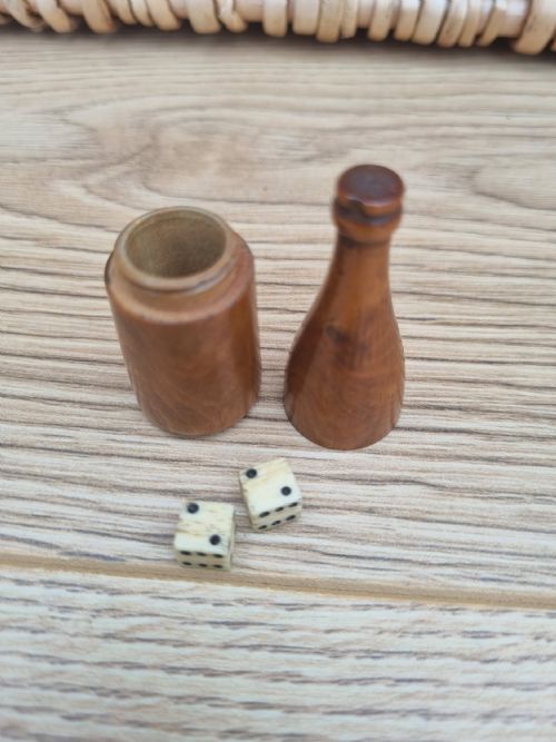 A Treen Dice Shaker in the Form of a Wine Bottle