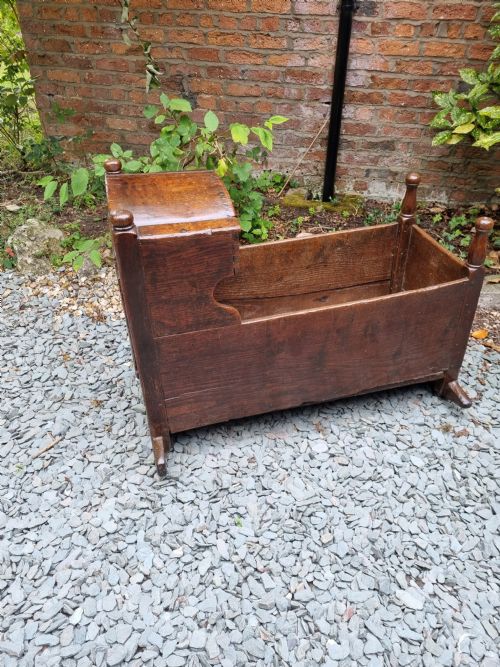 fig 1. MID 17THC WELSH OAK CRIB ON ROCKERS