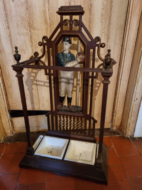 fig 1. RARE ORIGINAL 1893 FOOTBALLER CAST IRON STICK STAND
