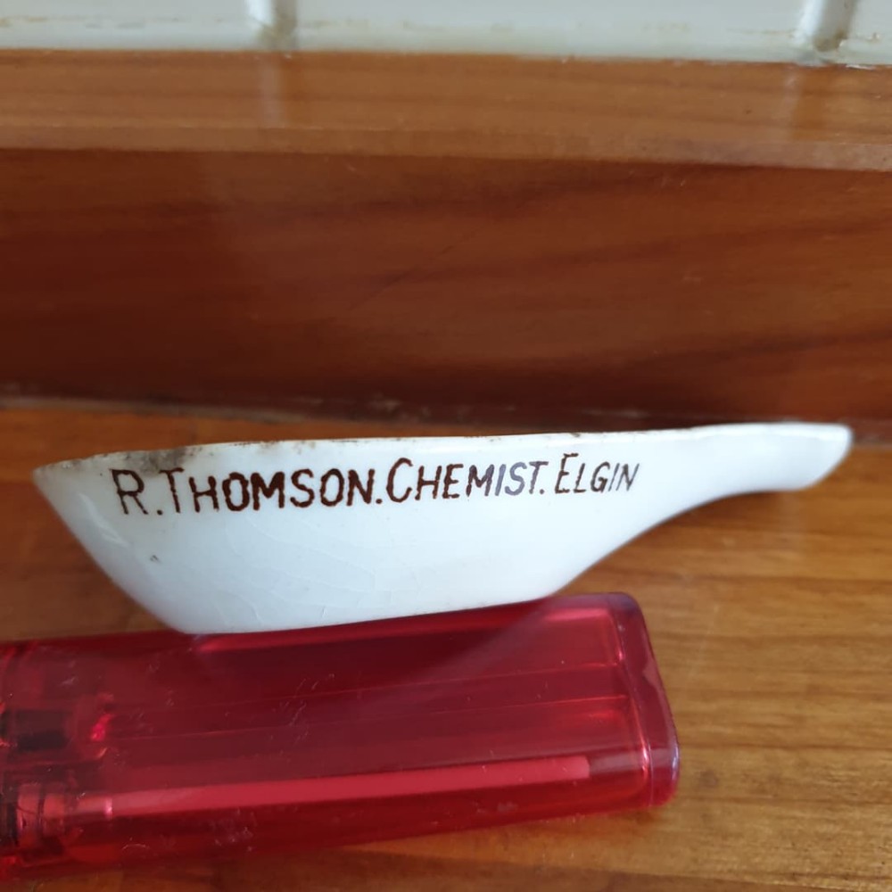 A RARE 19THC SCOTTISH POTTERY CHILD,S COD LIVER OIL SPOON 