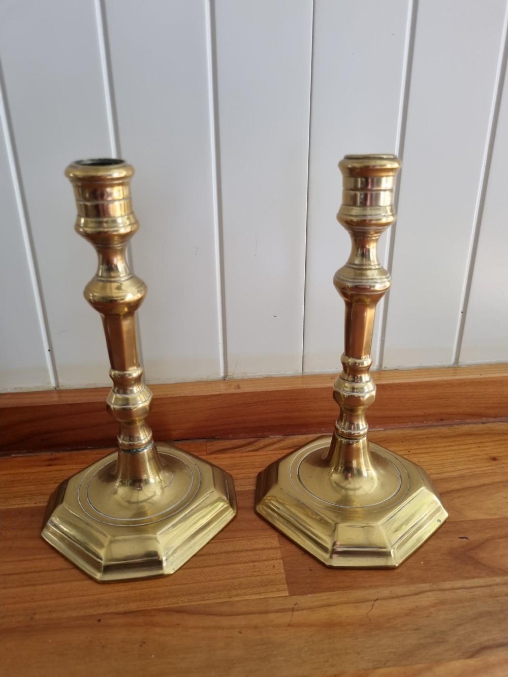 PAIR OF GEORGIAN BRASS CANDLESTICKS WITH OCTAGONAL BASES View II