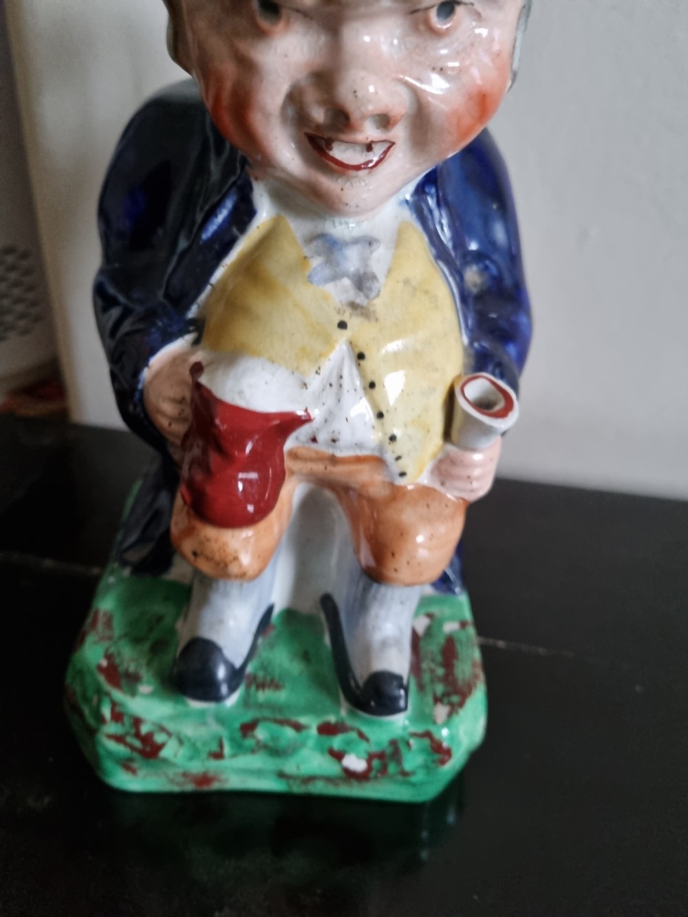 A LARGE 19THC STAFFORDSHIRE TOBY JUG  View V