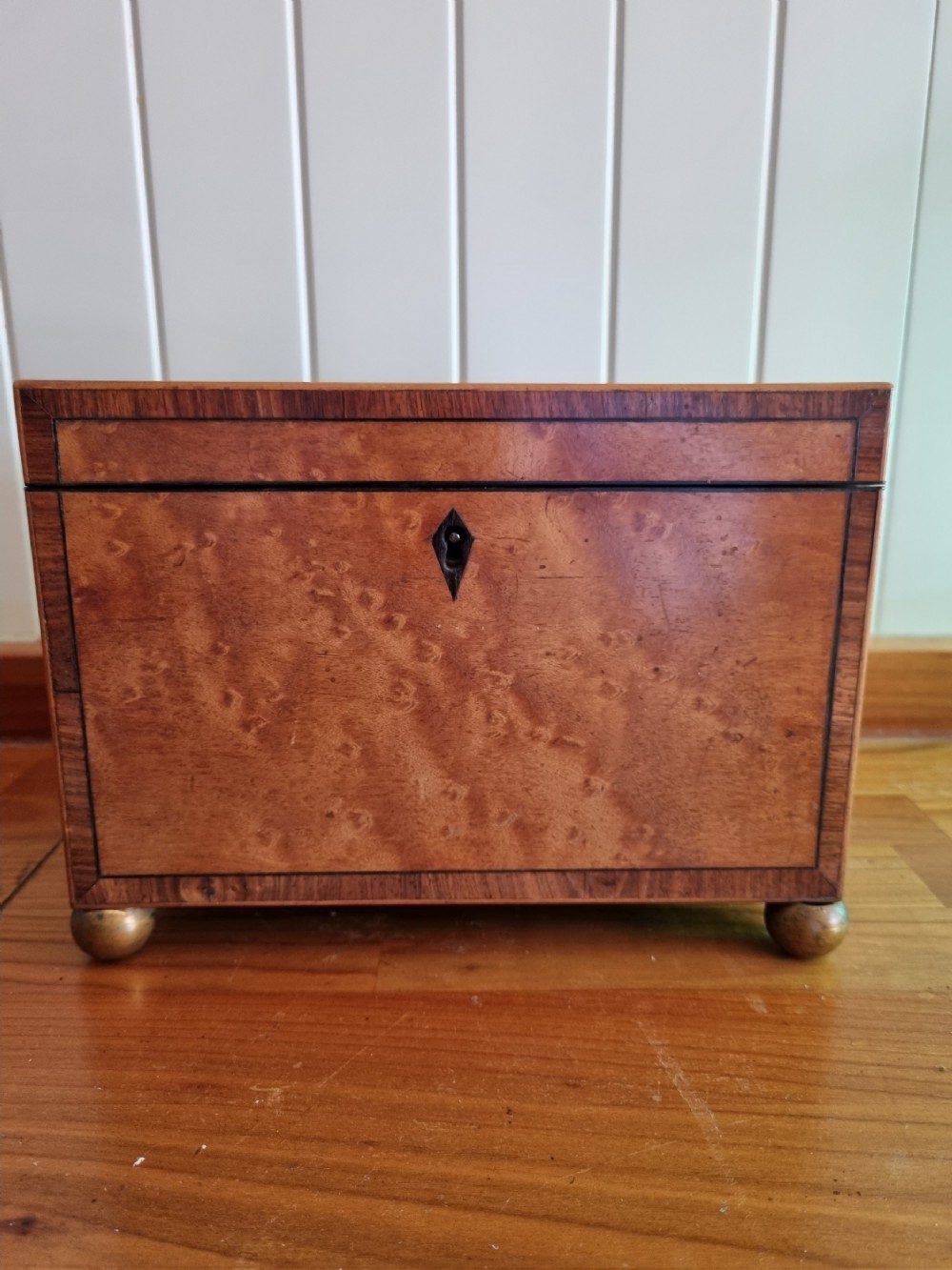 GEORGIAN BIRDS EYE MAPLE AND ROSEWOOD BANDED TEA CADDY