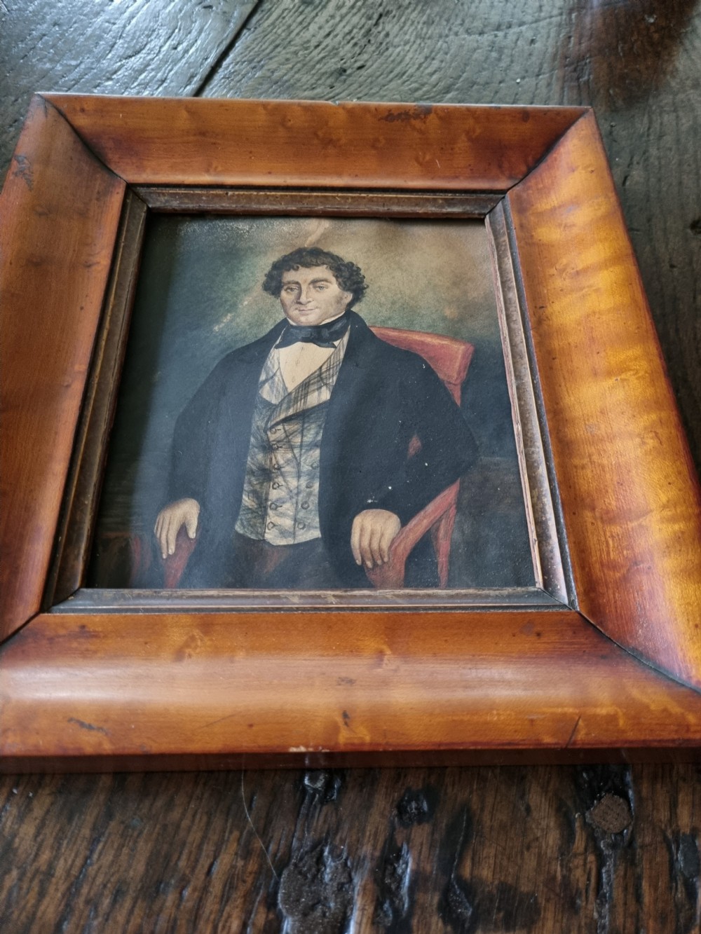 A  NAIVE 19THC WATERCOLOUR OF A COUNTRY GENT IN A MAPLE FRAME View III