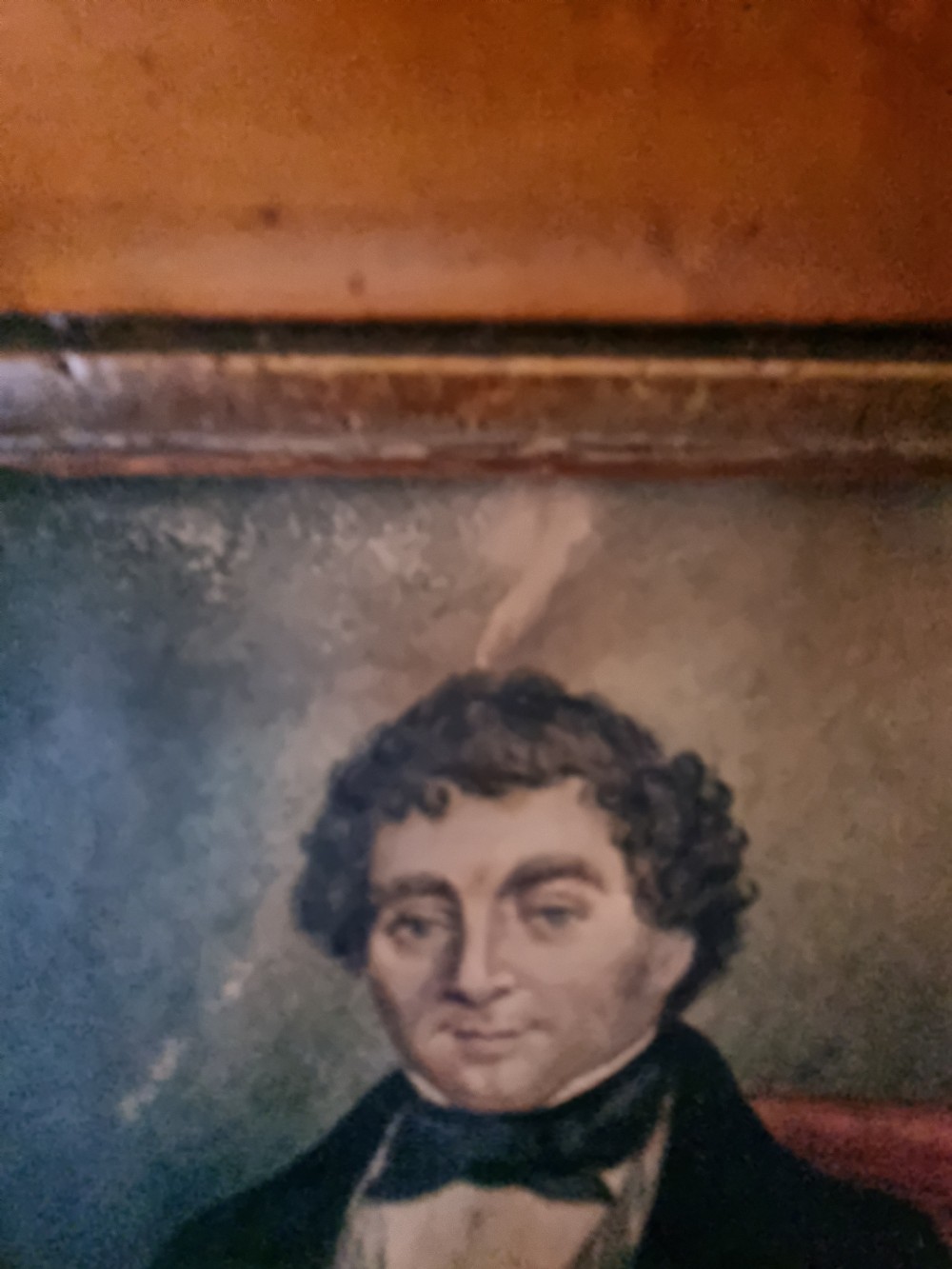 A  NAIVE 19THC WATERCOLOUR OF A COUNTRY GENT IN A MAPLE FRAME View V